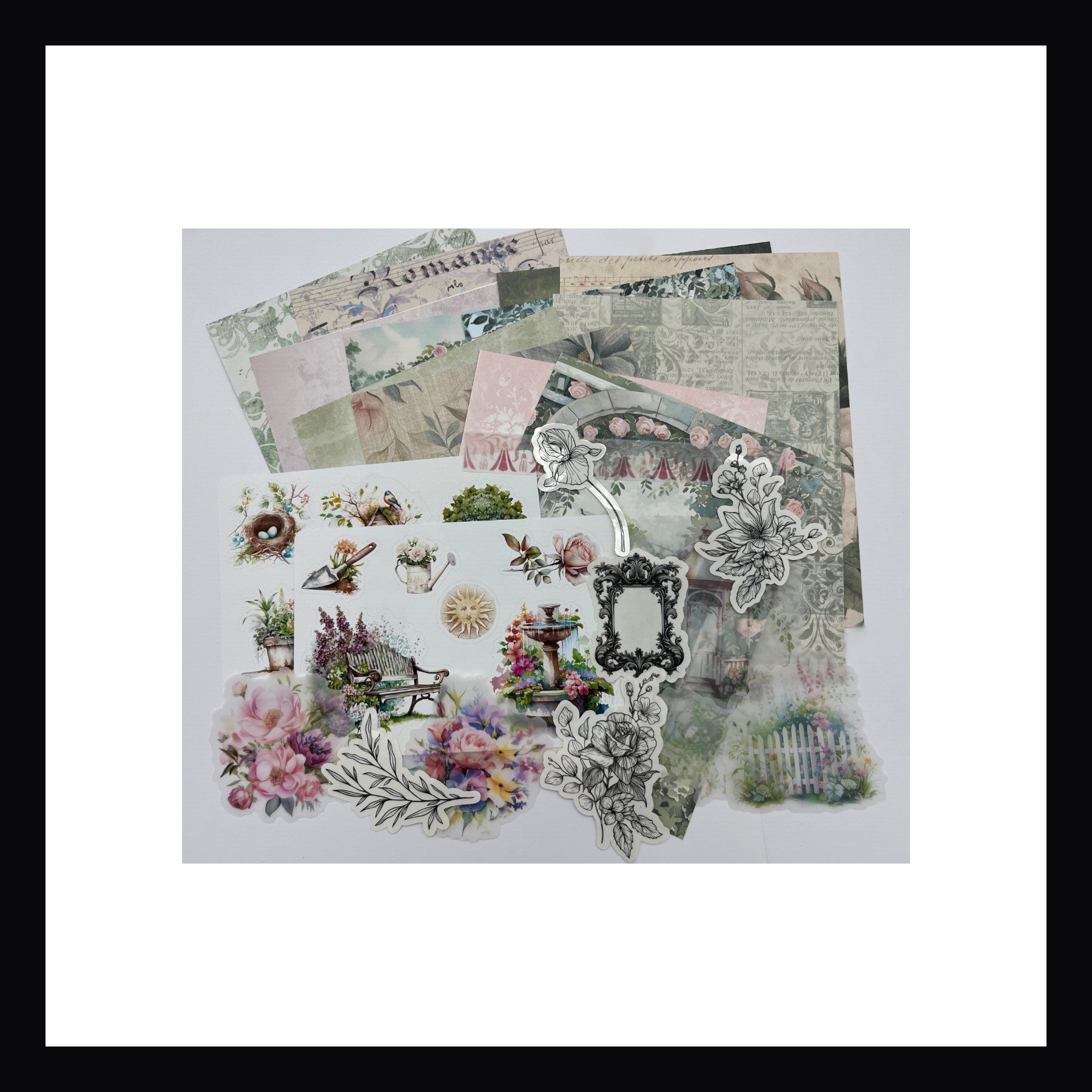 Gardening Junk Journal Kit features 12 double sided papers, 2 sticker sheets, 5 glossy clear stickers, and 6 vellum accents. This garden themed kit features watercolor floral designs.