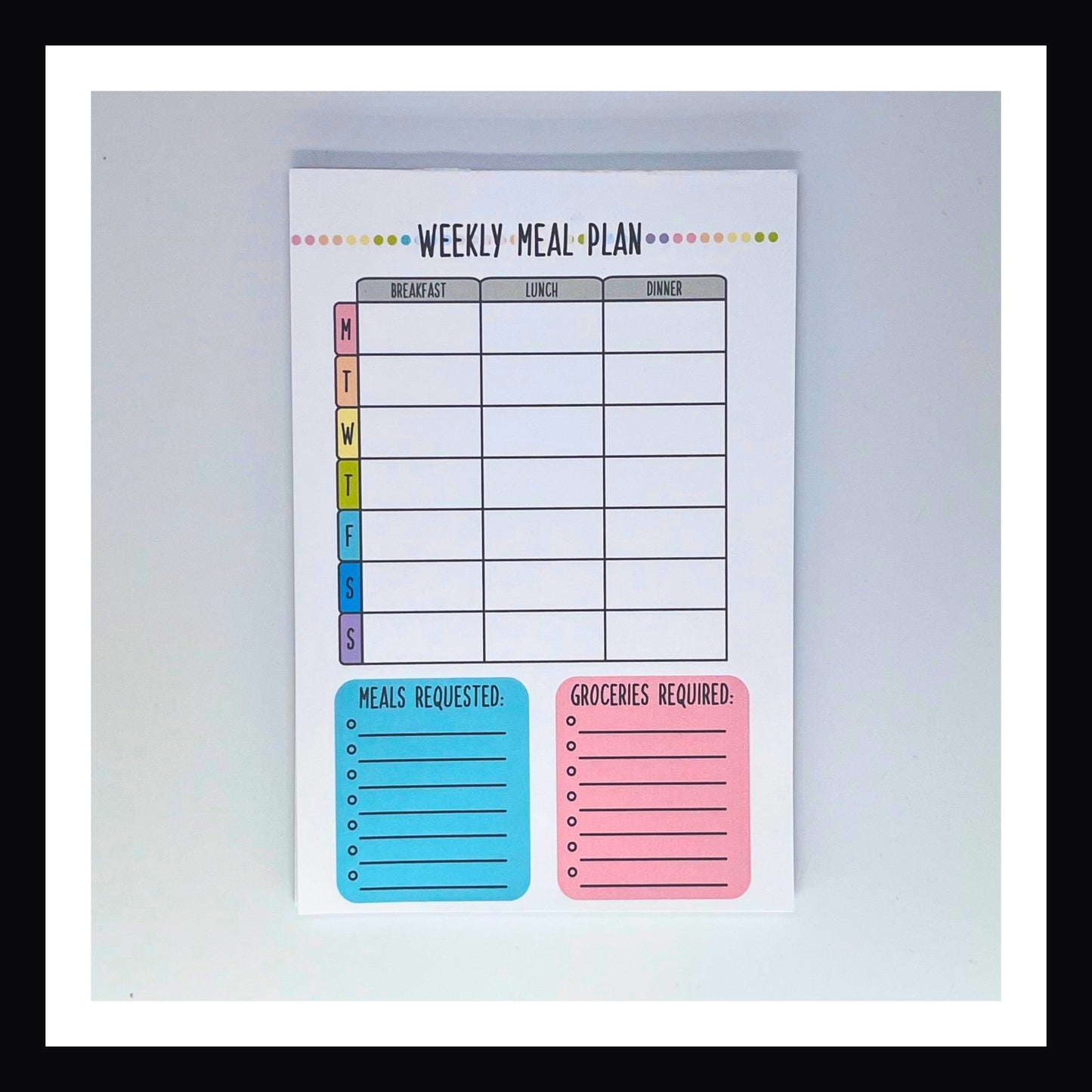 Weekly Meal Plan Notepad is a 5x7 inch notepad. It features a thick chipboard backing and 25 premium 120 gsm sheets. The design features a grid layout with space to plan breakfast, lunch and dinner for all 7 days of the week. Additional spaces for notes on meals requested and special groceries required.