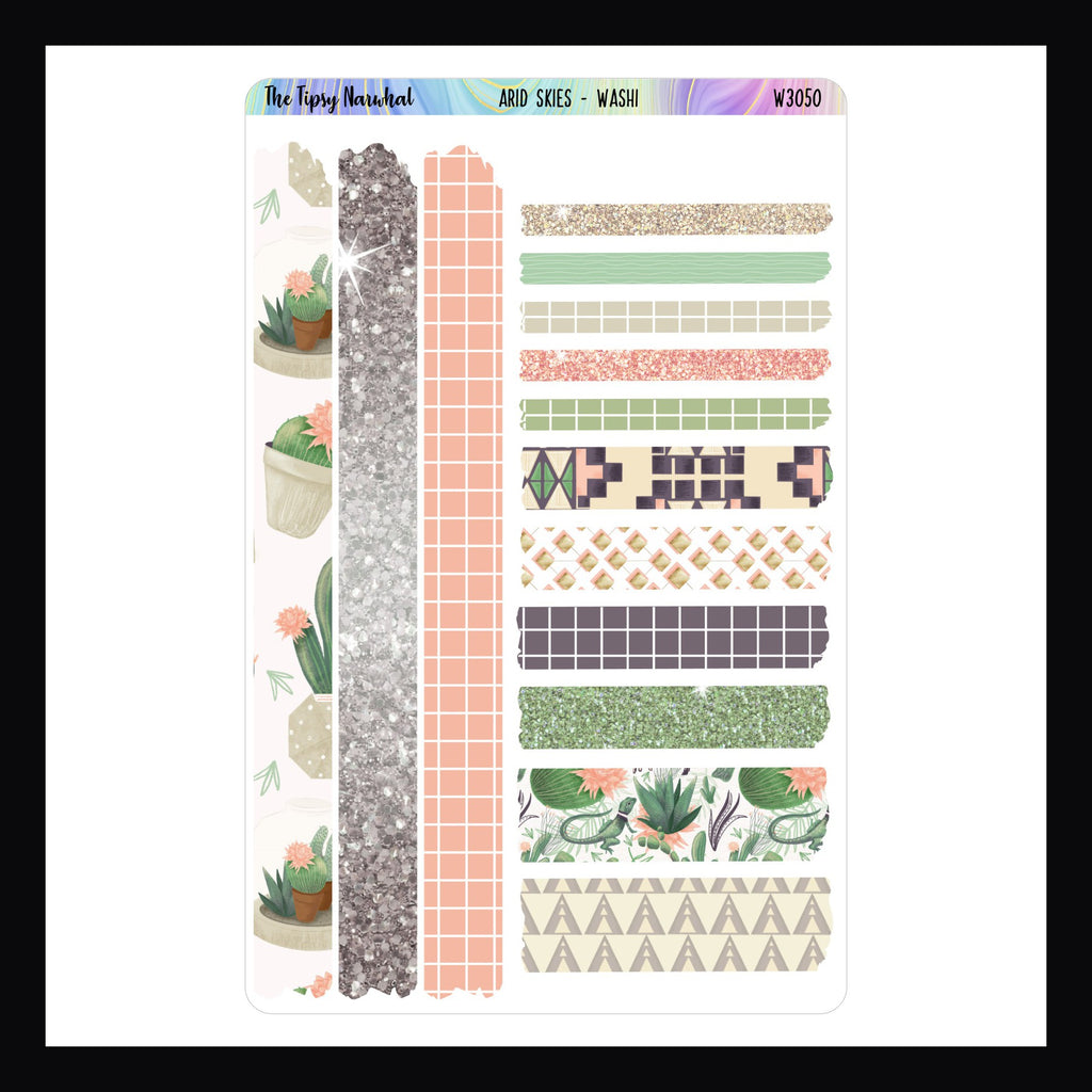 Collection of washi tape strips with various patterns on a white background