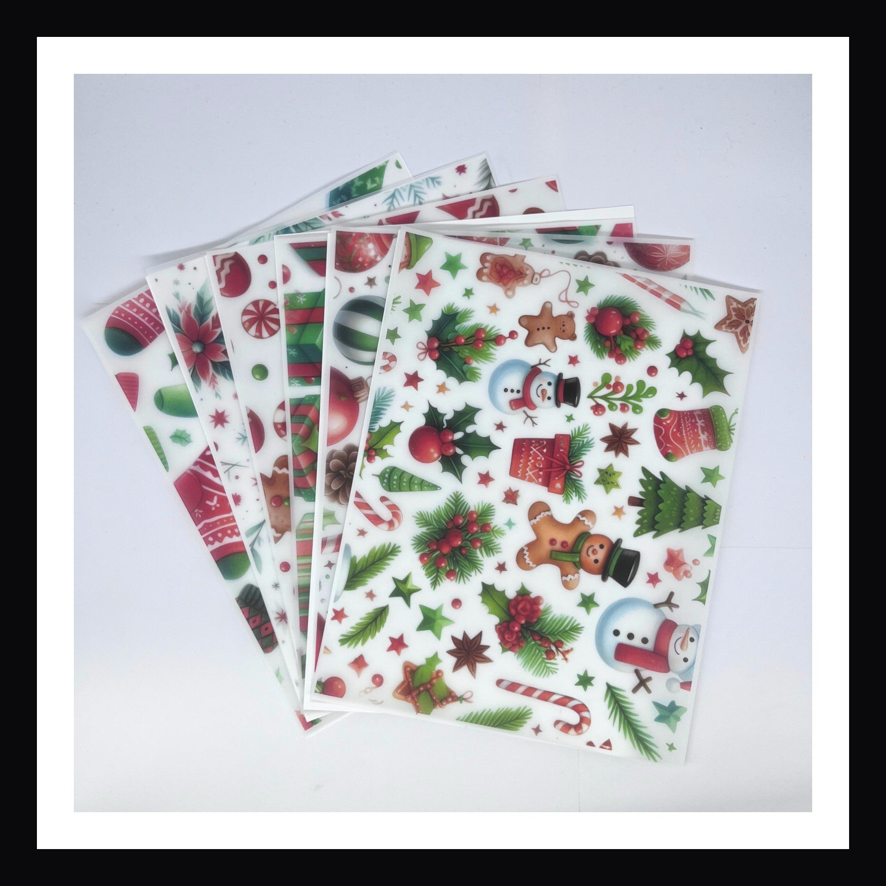 Christmas Morning Vellum is a collection of 6 sheets of printed vellum.  The collection focuses on the sights of Christmas morning and is done in a traditional color palette of red and green.