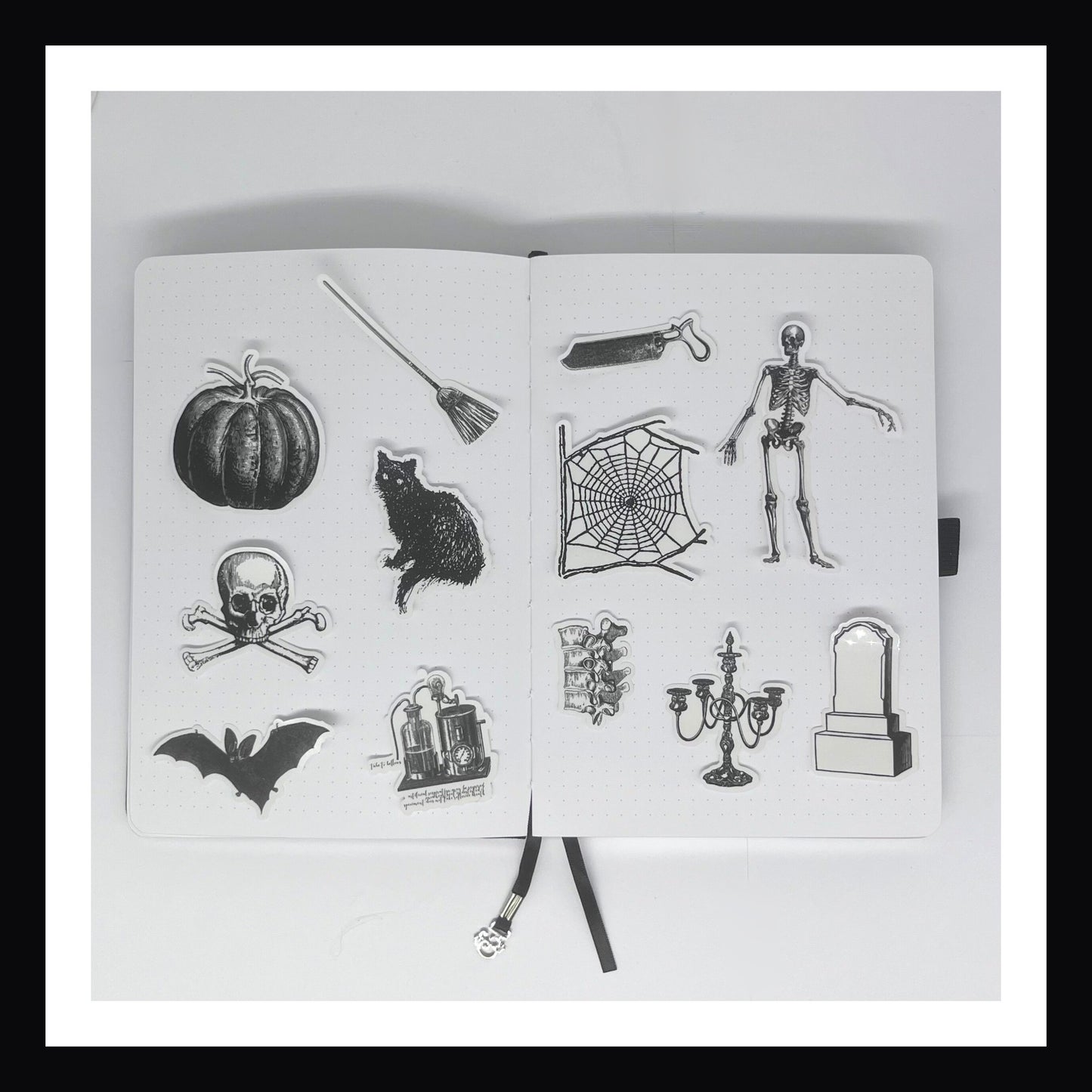 Deluxe Halloween Junk Journal Kit includes 12 clear and glossy stickers.  Each sticker features a unique spooky design and is fancy cut. 