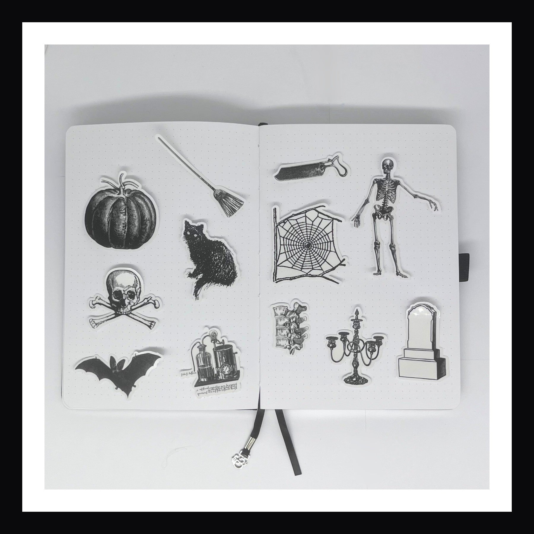 Deluxe Halloween Junk Journal Kit includes 12 clear and glossy stickers.  Each sticker features a unique spooky design and is fancy cut. 