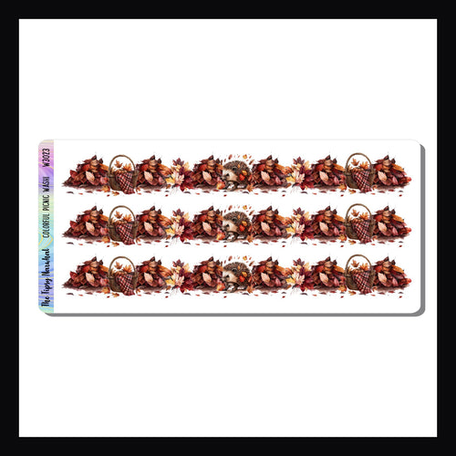 Colorful Picnic Washi features three strips of washi stickers.  Each strip features fallen leaves, picnic baskets and a hedgehog.  Coordinates with the Colors of Autumn Weekly Kits. 