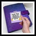 Drink Your Water Die Cut Sticker - purple polaroid shaped sticker reads "Drink your water, you gorgeous dehydrated bitch" shown on a purple planner.