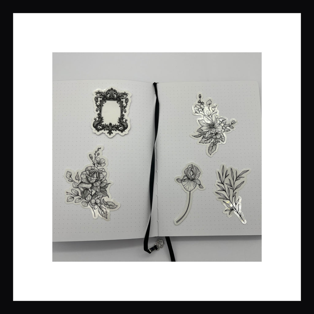 Gardening Junk Journaling Kit contains 5 glossy clear die cut stickers.  Stickers are of varying sizes and feature floral design and a vintage frame. 
