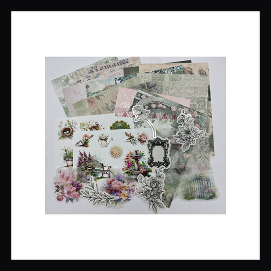 Gardening Junk Journal Kit features 12 double sided papers, 2 sticker sheets, 5 glossy clear stickers, and 6 vellum accents.  This garden themed kit features watercolor floral designs. 