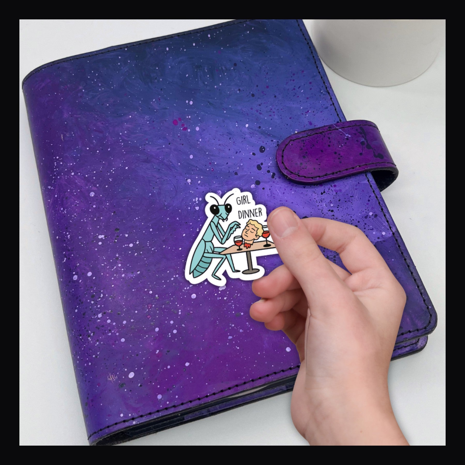 Girl Dinner Die Cut Sticker shown on purple planner