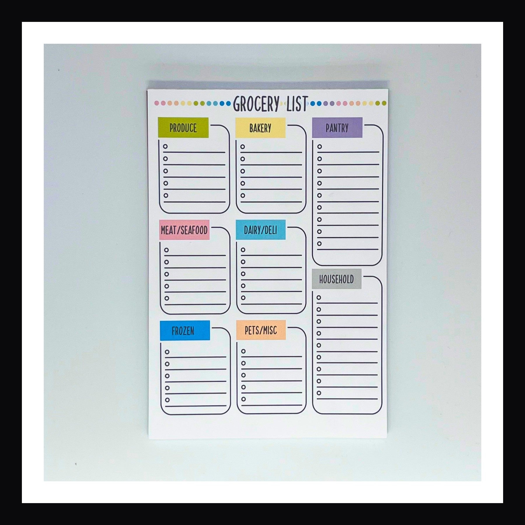 Grocery List Notepad is a 5x7 tear-away style notepad.  It features a thick chipboard backing, and 25 premium 120gsm pages. The list divides grocery items by department with extra space for household and pet items. 