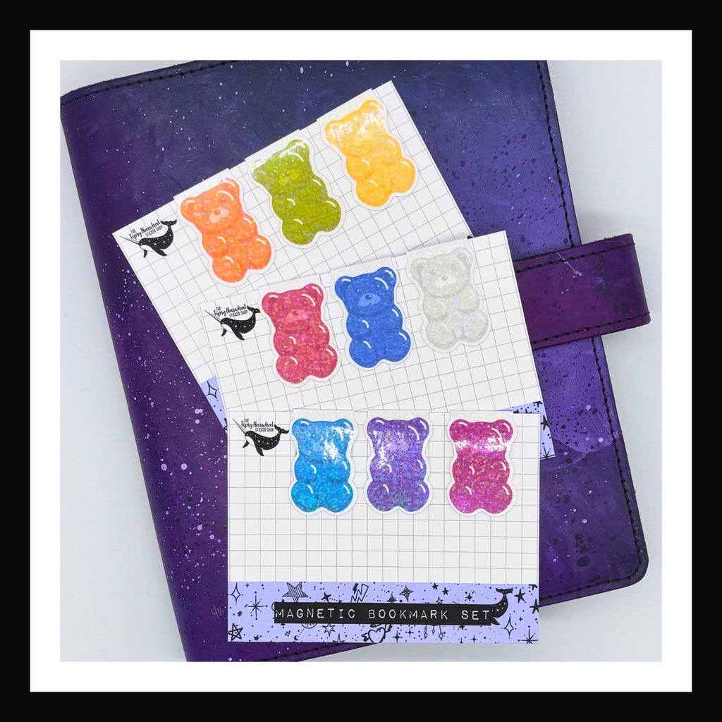 Magnetic Bookmark - Gummy Bear Trios all three choices shown on a purple planner.