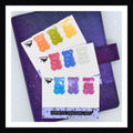 Magnetic Bookmark - Gummy Bear Trios all three choices shown on a purple planner.