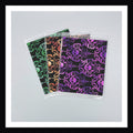 Halloween Glam Envelopes. Set of 3 reusable envelopes with a Halloween damask design. Shown on a white background.