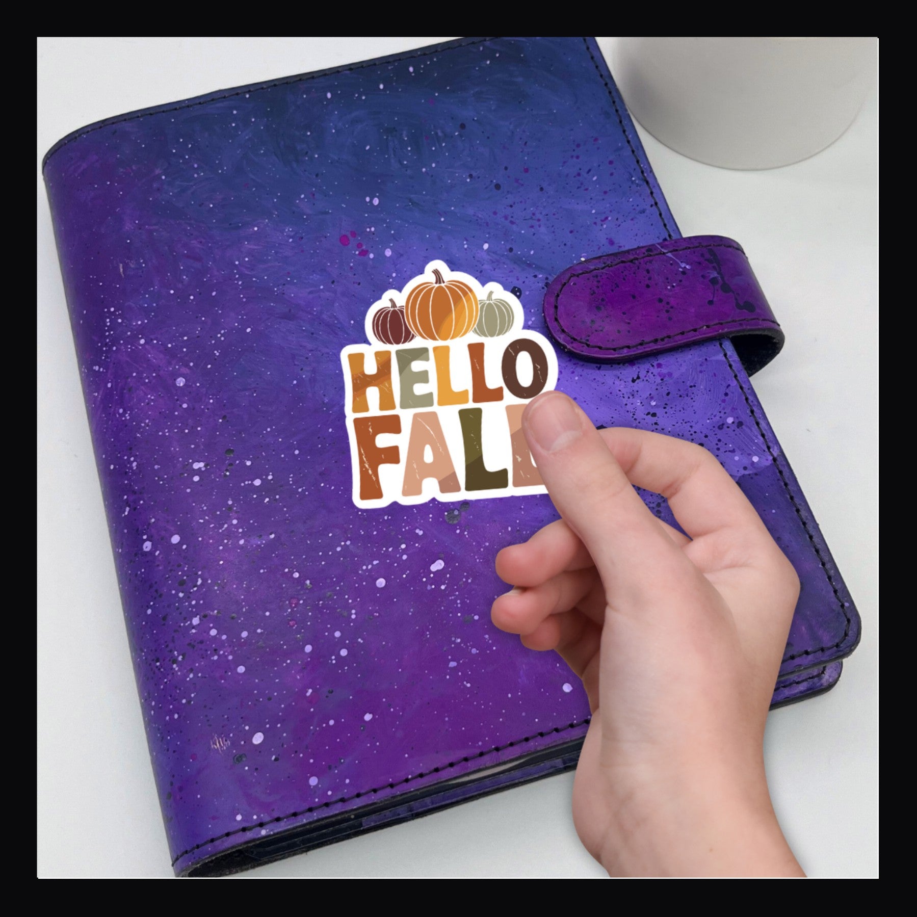 Hello Fall Die Cut sticker shown on purple planner.