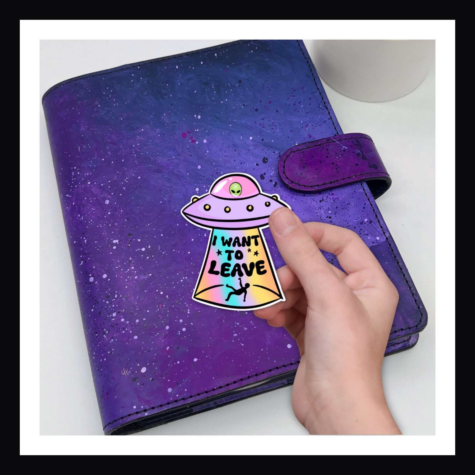 Die Cut Sticker - I want to leave.  UFO theme sticker shown on a purple planner.