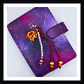 It's Fall Y'all charm features an handmade autumn leaf charm, a friendship-bracelet-style beaded tag that reads "its fall y'all" and is finished with a dark red knot made of paracord with orange and yellow beads. Attaches via a sturdy lobster clasp.