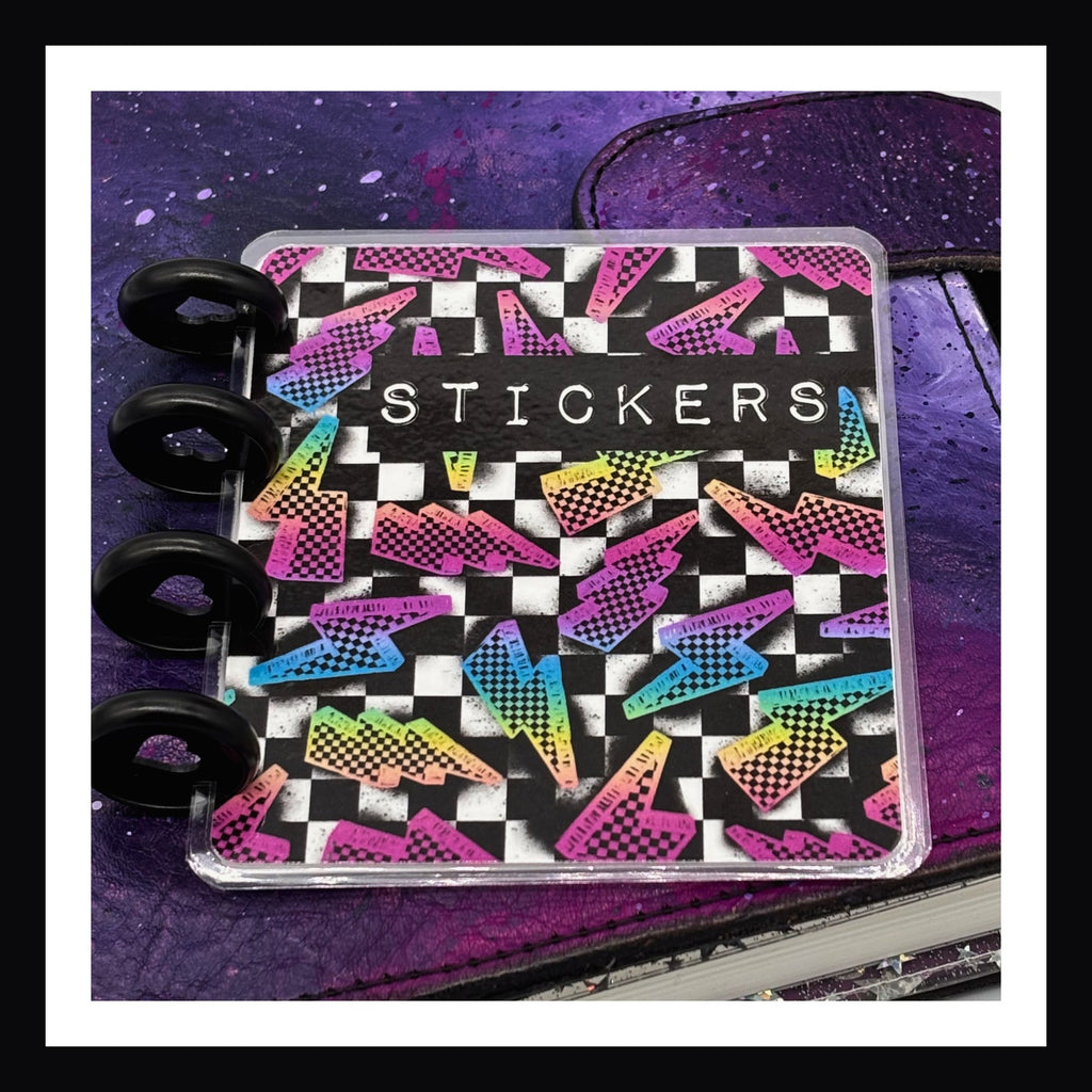 Freestyle Mini Discbound Cover - rainbow lightening bolt cover shown on a purple planner.