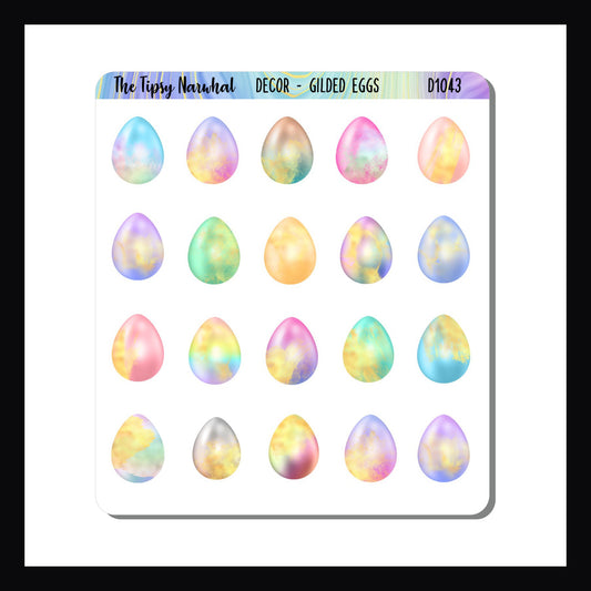 Gilded Eggs Decor Sheet features colorfully dyed Easter eggs all gilded with some gold. 20 egg stickers total.
