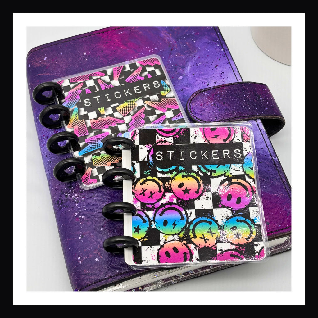 Freestyle Mini Discbound Covers - mini discbound laminated covers shown sitting on a purple planner. 