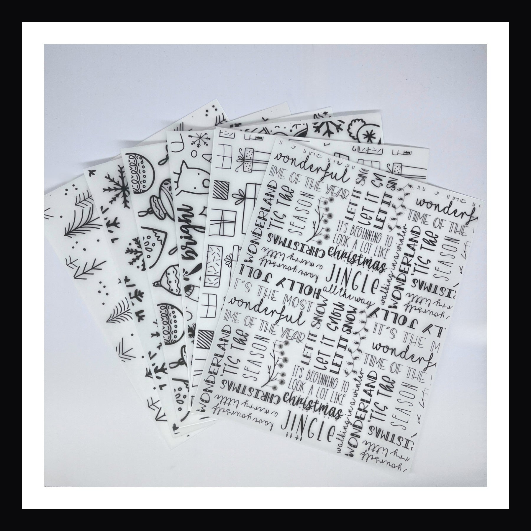Monochromatic Christmas Vellum.  Set of 6 printed sheets of vellum. Each features a unique design in a modern black and white style.