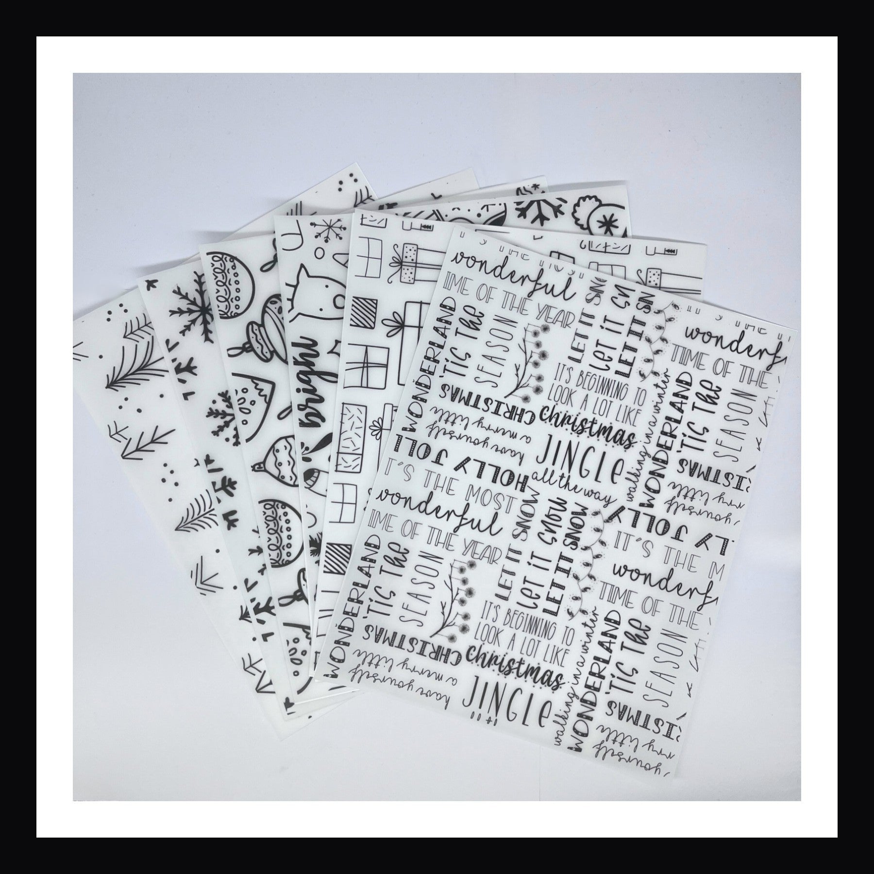 Monochromatic Christmas Vellum.  Set of 6 printed sheets of vellum. Each features a unique design in a modern black and white style. 