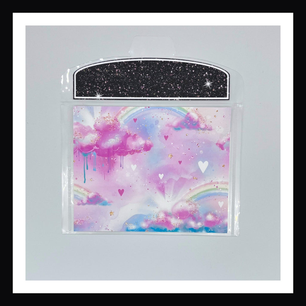Neon Rainbow Envelope number 3 features a rainbow with clouds and hearts design. Shown on a white background. 