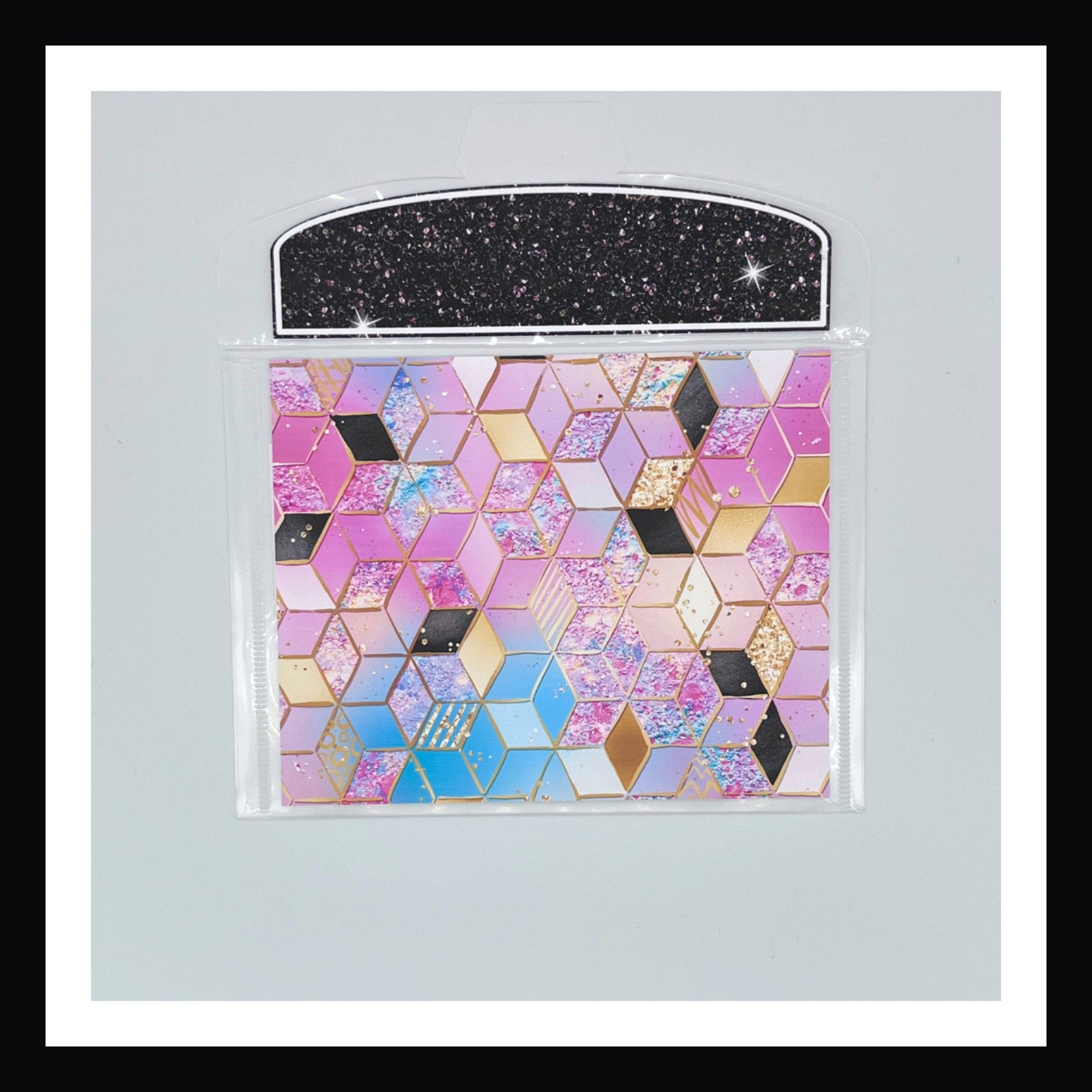 Neon Rainbow Envelope number 2 features a bright geometric pattern. Shown on a white background. 