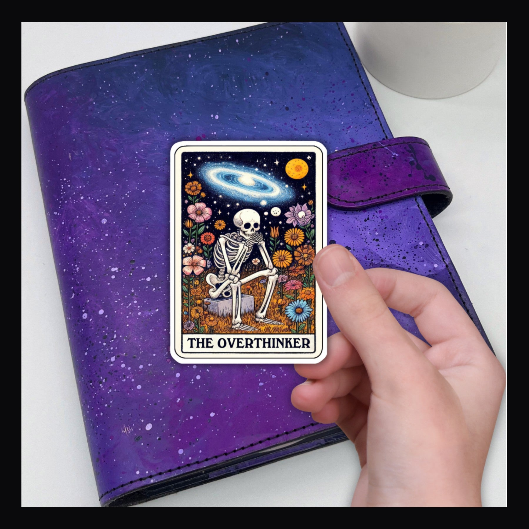 Alternative Tarot Die Cut - The Overthinker shown here on a purple planner.
