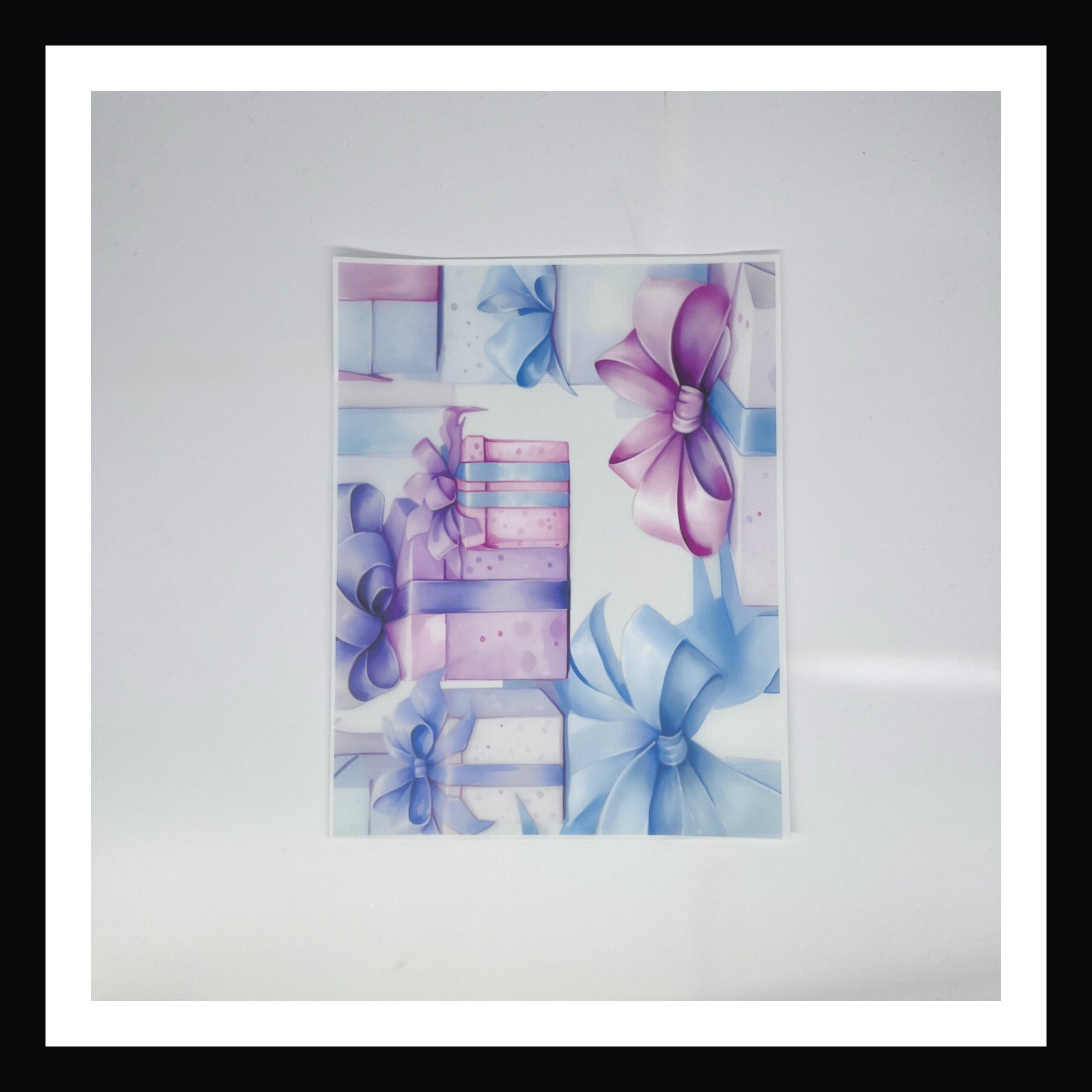 Pastel Watercolor Christmas Vellum - Pastel Watercolor Gifts is an 8x10 sheet of vellum featuring a collection of gifts wrapped in pastel pinks, blues and lavenders. 