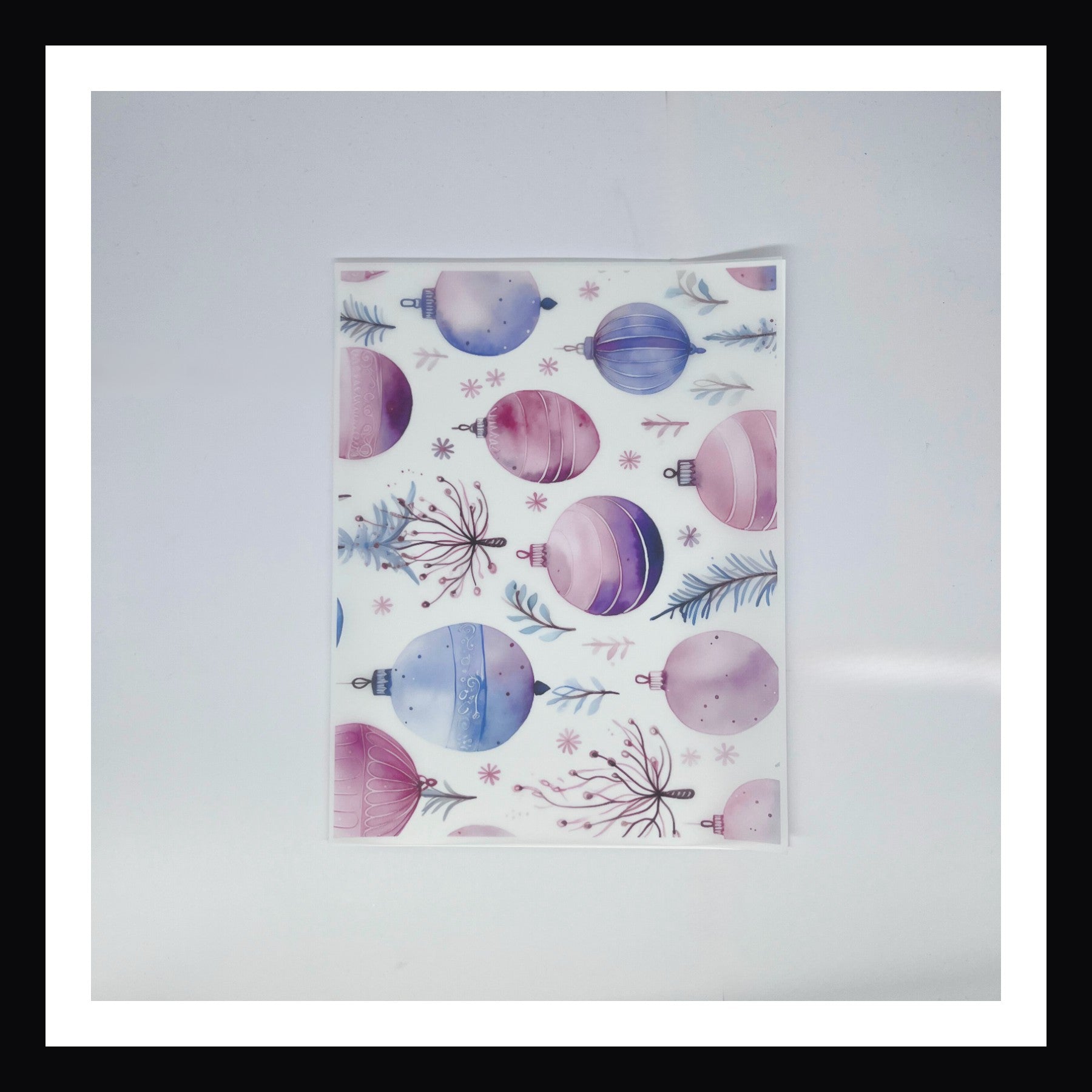 Pastel Watercolor Christmas Vellum - Pastel Watercolor Ornaments is an 8x10 sheet of printed vellum.  The design features an array of holiday ornaments done in a watercolor style with a pastel color palette. 