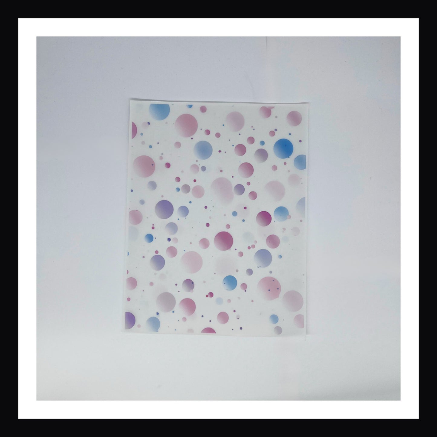 Pastel Watercolor Christmas Vellum - Pastel Watercolor Polka Dots is a 8x10 sheet of printed vellum.  Features a polka dot design done in various pastel hues of pink, lavender and blue. 