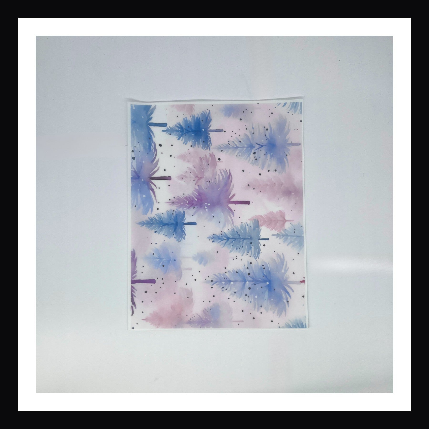 Pastel Watercolor Christmas Vellum - Pastel Watercolor Trees is a 8x10 sheet of printed vellum.  The featured design consists of a pastel forest of trees with a dreamy like haze of snow.  