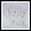 Pink Christmas Vellum is a collection of 5 sheets of 8x10 printed vellum.  Each sheet features a unique Christmas print in a delicate light pink. 