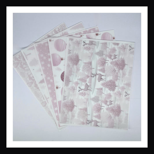 Pink Christmas Vellum is a collection of 5 sheets of 8x10 printed vellum.  Each sheet features a unique Christmas print in a delicate light pink. 