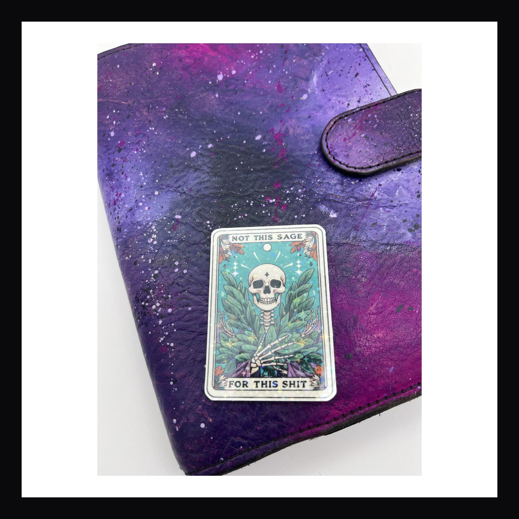 Alternative Tarot Die Cuts - Not This Sage is a holographic die cut sticker featuring a skeleton holding two bundles of sage. 