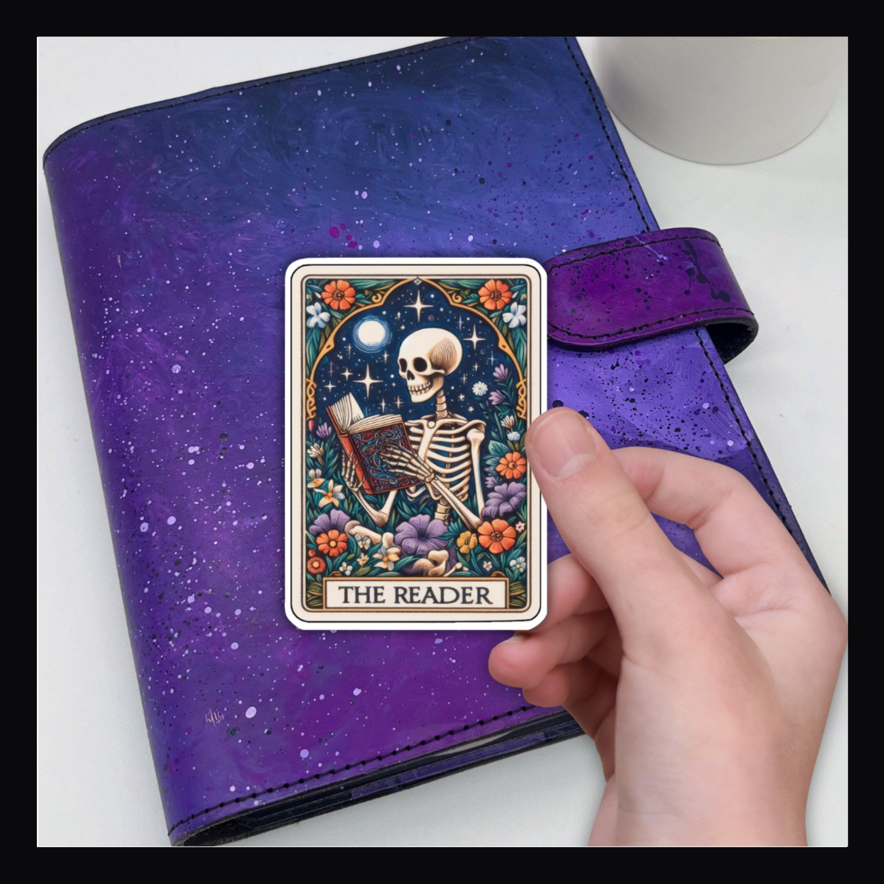 Alternative Tarot Die Cut - The Reader shown here on a purple planner.