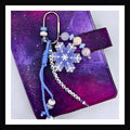 Zero Flakes Given Carabiner Bag Charm.  Featuring a handmade snowflake charm, and a beaded tag that reads "Zero Flakes Given" this bag charm will add some icy sparkle to any bag, backpack or planner.